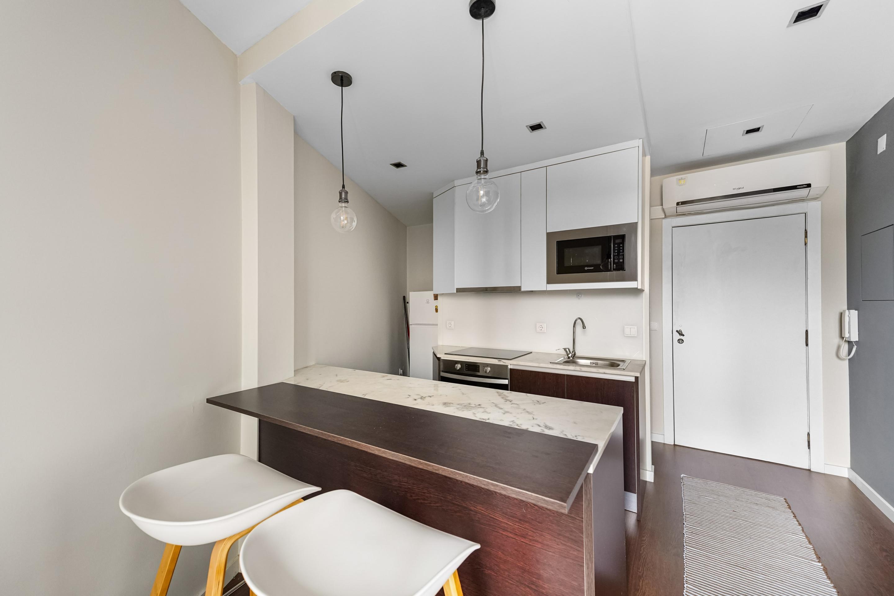 Studio apartment in front of the metro station!